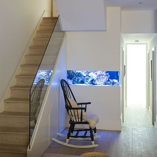 white and natural oak floor walls of pale hallway and staircase