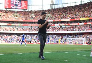 Arsenal manager Mikel Arteta applauds the fans after the Premier League match between Arsenal FC and Leicester City at Emirates Stadium on August 13, 2022 in London, England.
