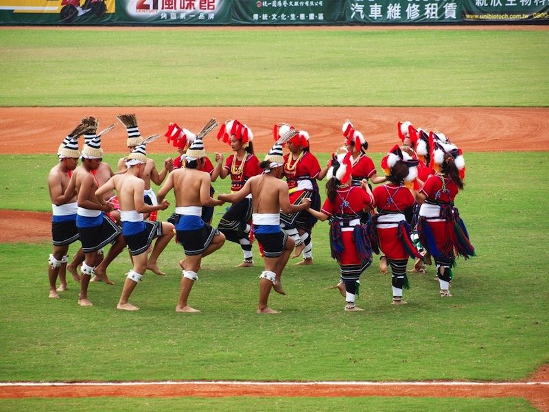 aboriginal taiwanese dance at a baseball game.