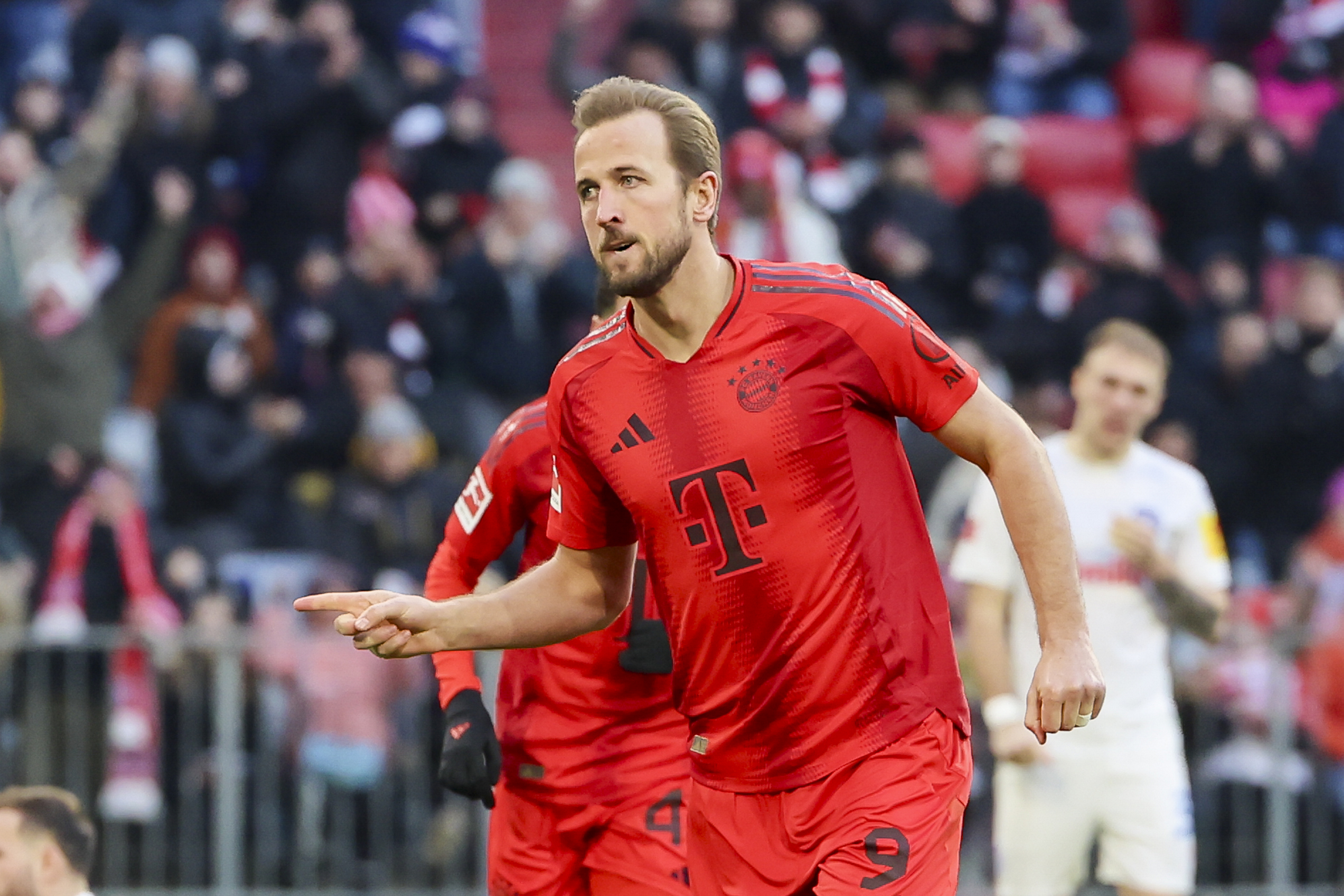 Harry Kane celebrates after scoring for Bayern Munich against Holstein Kiel in the Bundesliga in February 2025.