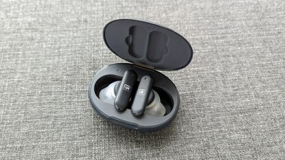 Ultimate Ears UE Fits review: man wearing headphones from the side