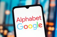 Alphabet and Google logo is seen displayed on a smartphone screen