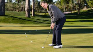 Paul Foston demonstrating a putting drill to stop three-putts