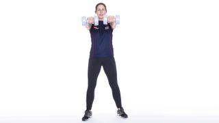 Woman doing a front & side dumbbells raise as part of a dumbbell arms workout