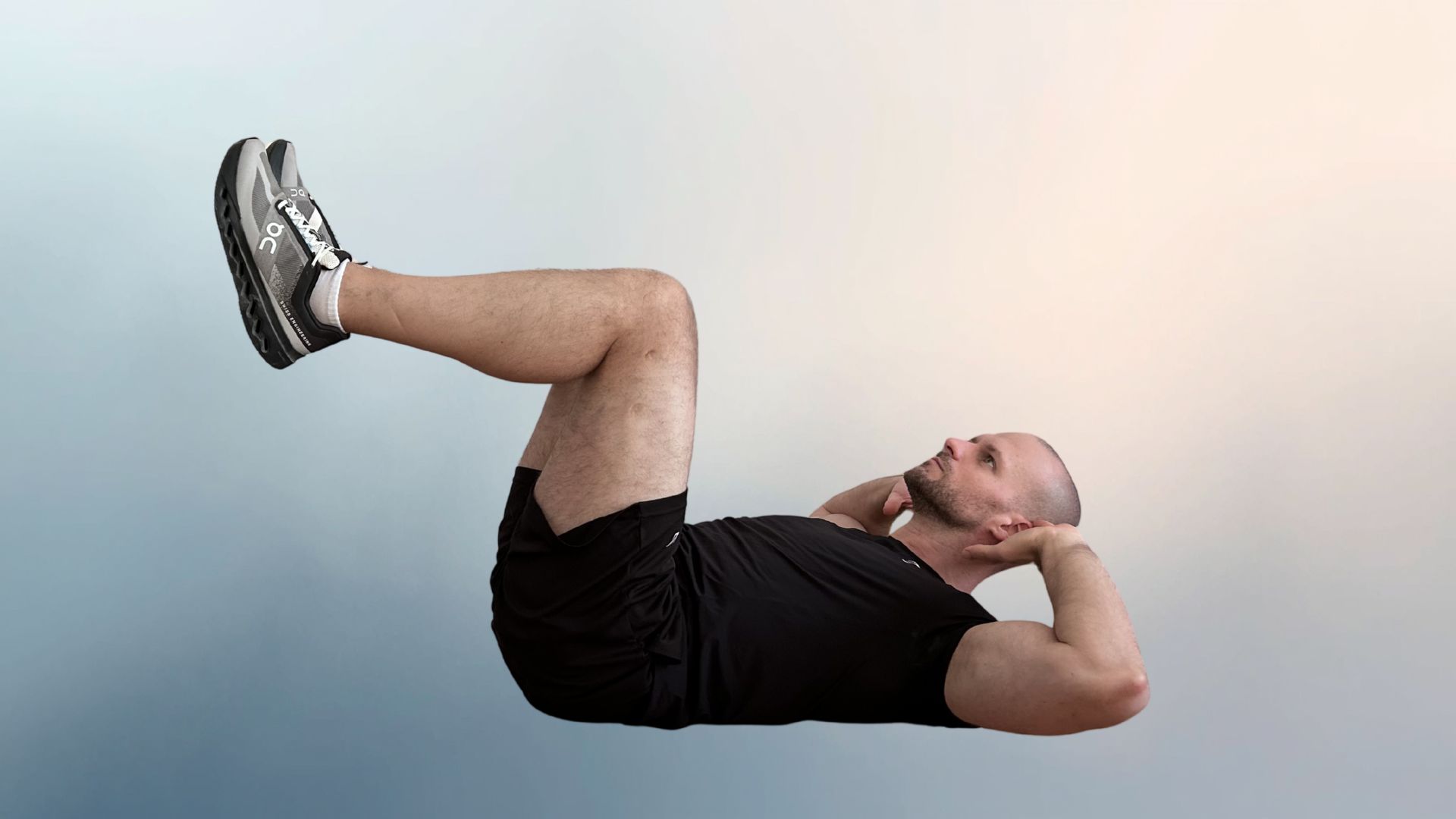 Man demonstrates the supine core hold