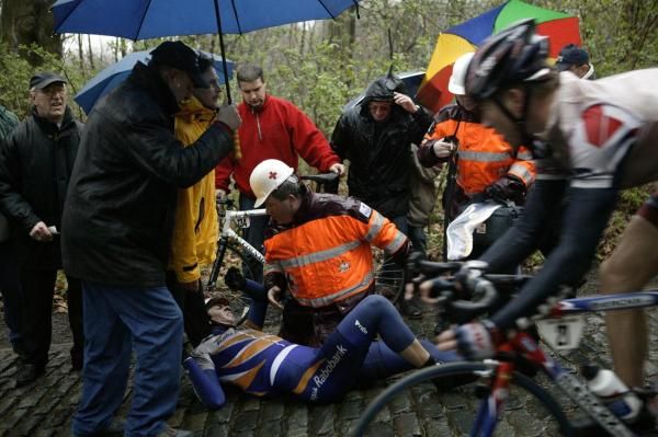 People rush to Mathew Hayman's aid when he fell at the 2004 Gent-Wevelgem.