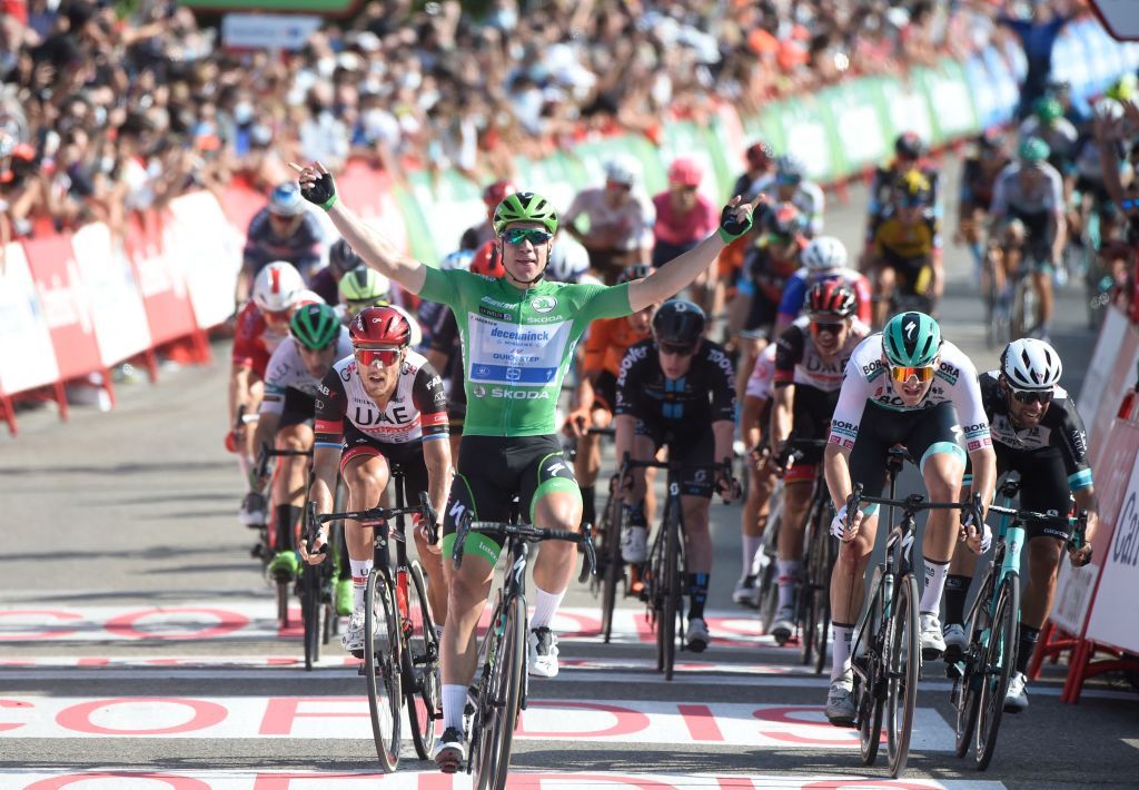 Team Deceunincks Dutch rider Fabio Jakobsen C celebrates as he wins the 16th stage of the 2021 La Vuelta cycling tour of Spain a 180 km race from Laredo to Santa Cruz de Bezana on August 31 2021 Photo by MIGUEL RIOPA AFP Photo by MIGUEL RIOPAAFP via Getty Images