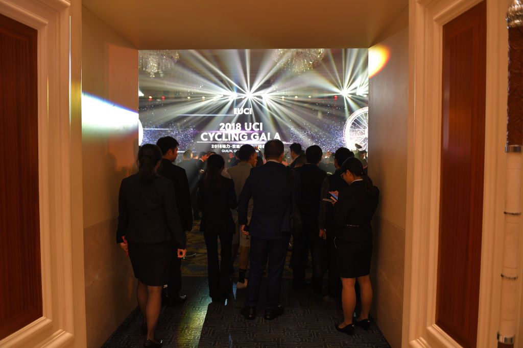 Guests file in