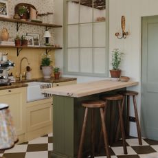House Nine X COAT green and yellow country kitchen with peninsula island