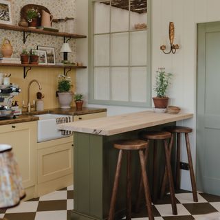 House Nine X COAT green and yellow country kitchen with peninsula island