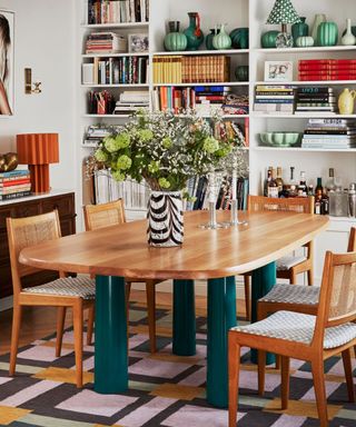 neutral dining room with colorful furniture and decor