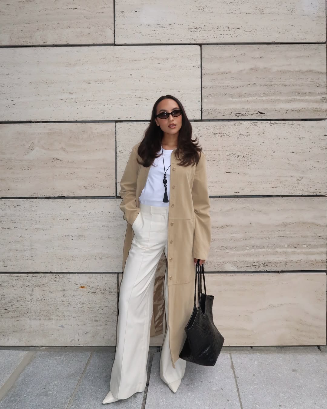 Ingrid in trench and tailored trousers