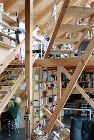 Interior with wooden structure at Daita2019, a Japanese house