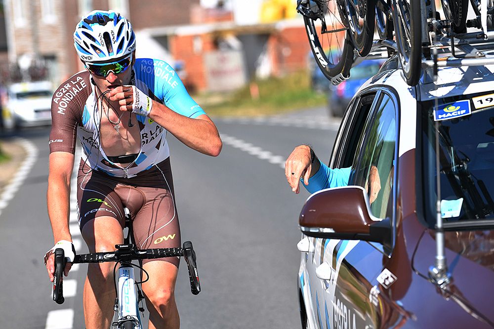 Ag2R gets assistance from a team car