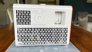 BenQ X3100i home cinema projector side view showing controls and ventilation grilles