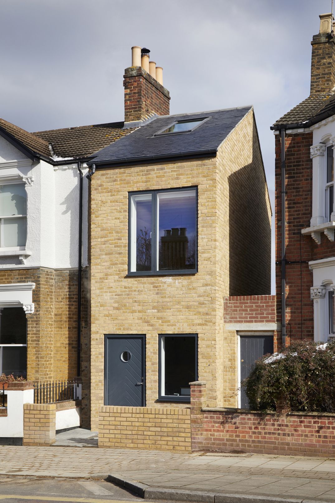 a narrow infill house