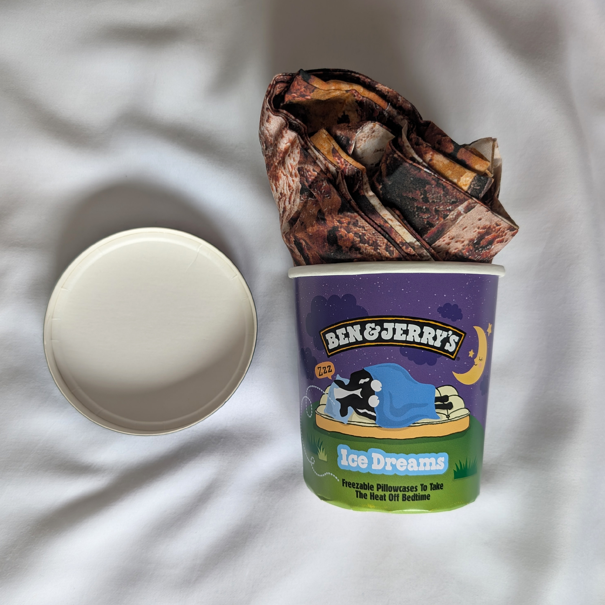 Ben &amp;amp; Jerry's freezable pillowcase in an icecream tub