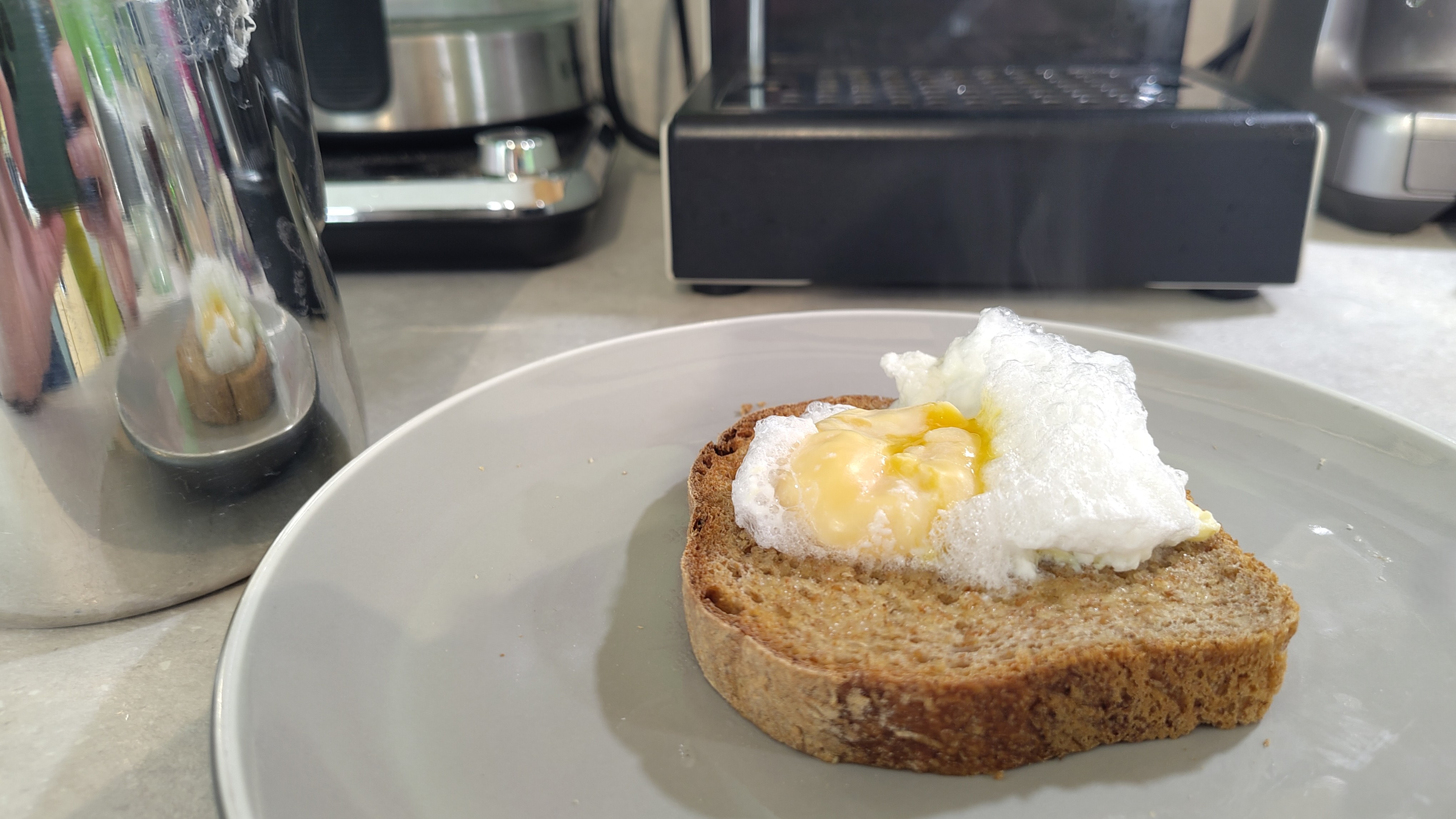 Eggs on toast poached using coffee maker steam wand