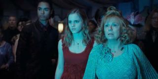 Emma Watson, Rege Jean Page, and Julie Walters in Harry Potter and the Deathly Hallows Part 1