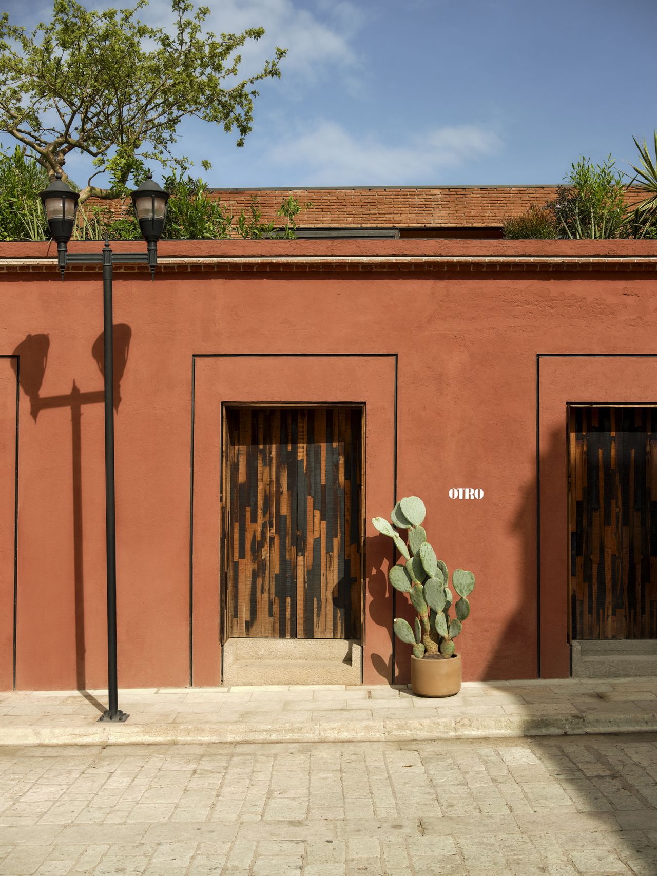 Otro Oaxaca&#039;s terracotta entrance walls