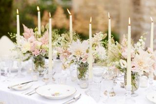 floral table display with candles by Paul Thomas