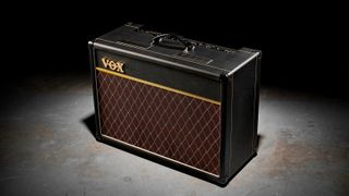Vox amp in dark room, with concrete floor