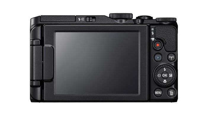 Back view of Nikon Coolpix S9900featuring a large LCD screen, control dials, buttons, and a foldable design for easy handling