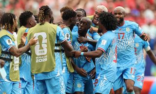 Yoane Wissa of Congo DR celebrates with teammates after scoring the team's first goal during the FIFA World Cup 2026 Group K match between Portugal and Congo DR at Houston Stadium. 