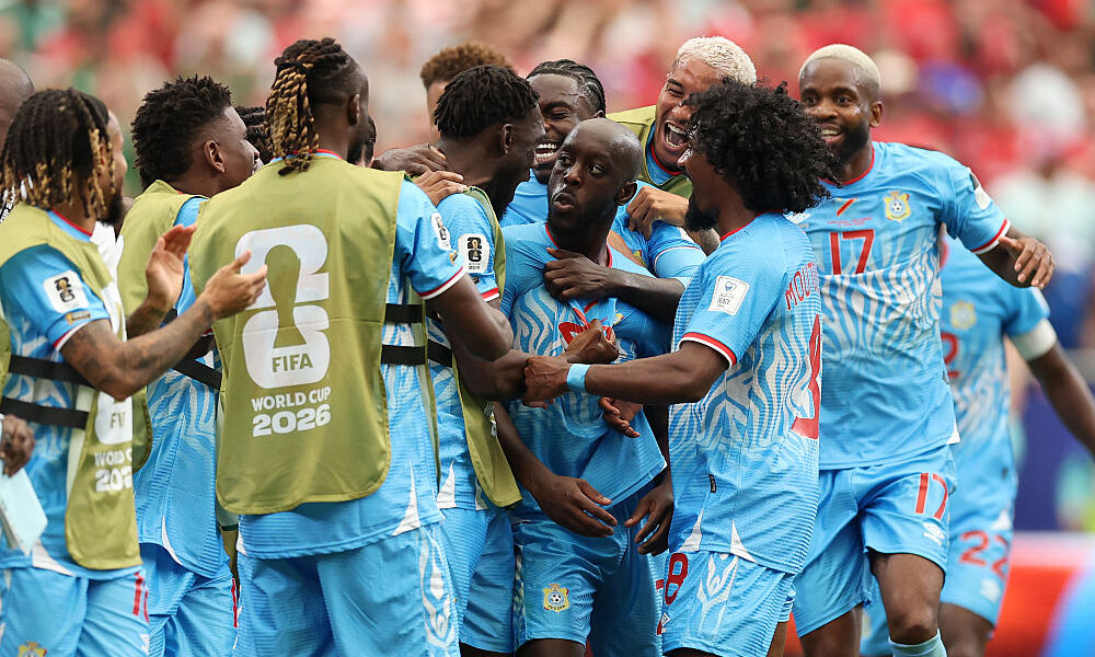 Yoane Wissa of Congo DR celebrates with teammates after scoring the team's first goal during the FIFA World Cup 2026 Group K match between Portugal and Congo DR at Houston Stadium.