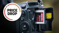 SanDisk 512GB CFexpress card in a Nikon camera, with the words "Price drop"