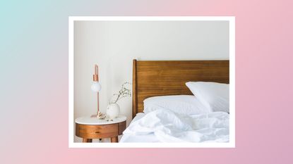 A ombre background with an image of a bed with a wooden headboard and white sheets on it. 