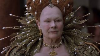 Dame Judi Dench dressed as an angry looking Queen Elizabeth I in Shakespeare In Love.