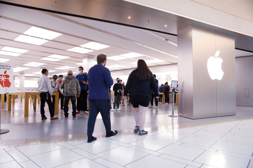 Shoppers in an Apple Store.