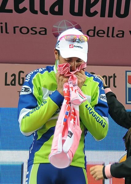 Ivan Basso on the podium with the maglia rosa.