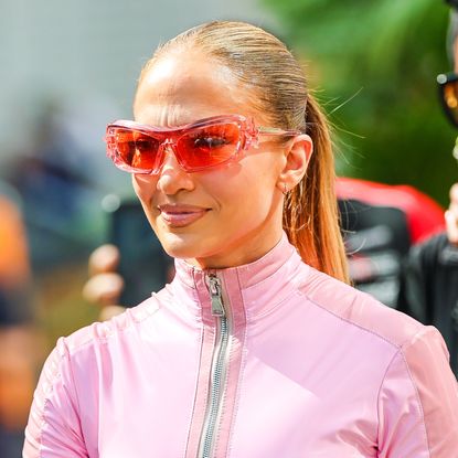 Jennifer Lopez wearing a pink PVC catsuit