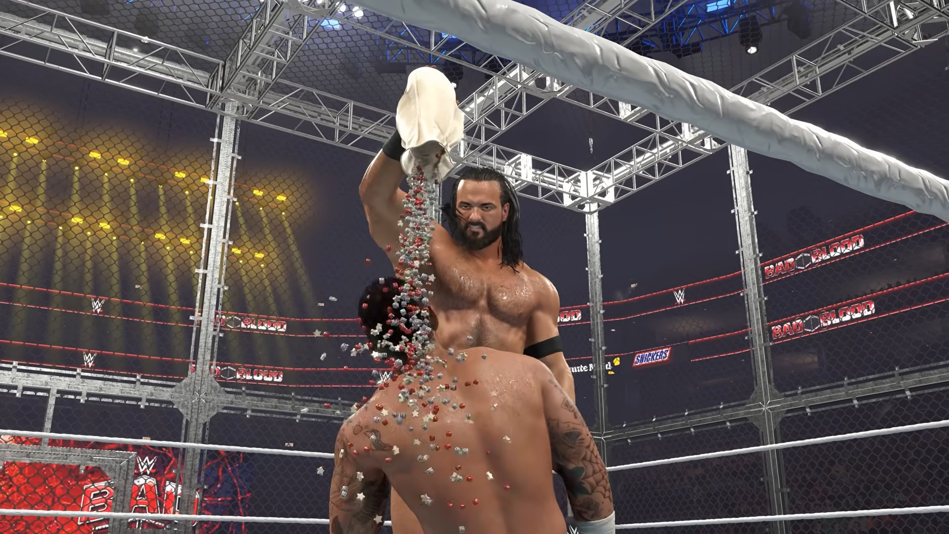 An image of Drew McIntyre emptying a bag of multicoloured items over a competitor's head in upcoming wrestling game WWE 2K26