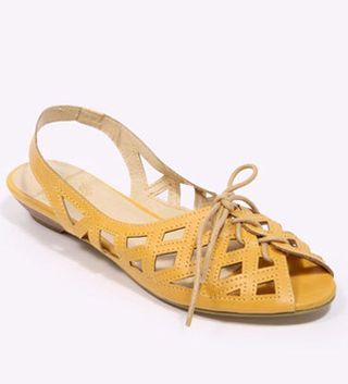 Urban Outfitters Ecote mustard cut-out lace-up sandals, £32