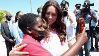 Kate Middleton taking a selfie with a teenager in the Caribbean