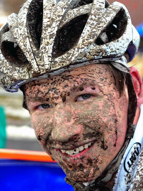 The course thawed out leaving Junior racers covered in mud.