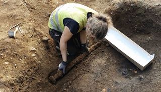 Archaeologist Astrid Kviseth is the first person to lift this Viking sword in about 1,100 years. It was buried with a warrior who lived in what is now Trøndelag, Norway.