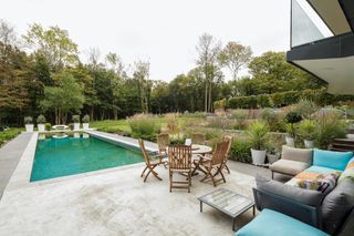 garden with pool and hidden retaining walls