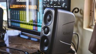 IK Multimedia iLoud Micro speaker on a desk