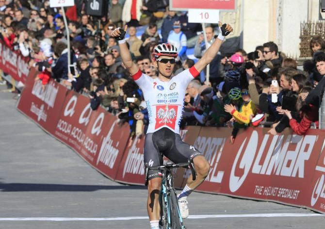 Polish champion Michal Kwiatkowski (Omega Pharma-QuickStep) celebrates his solo victory at Strade Bianche