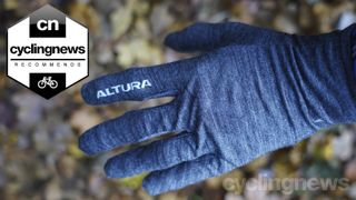 a close-up of an Altura Merino liner glove with recommends badge overlaid