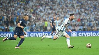 Kylian Mbappé and Lionel Messi in action during the World Cup final
