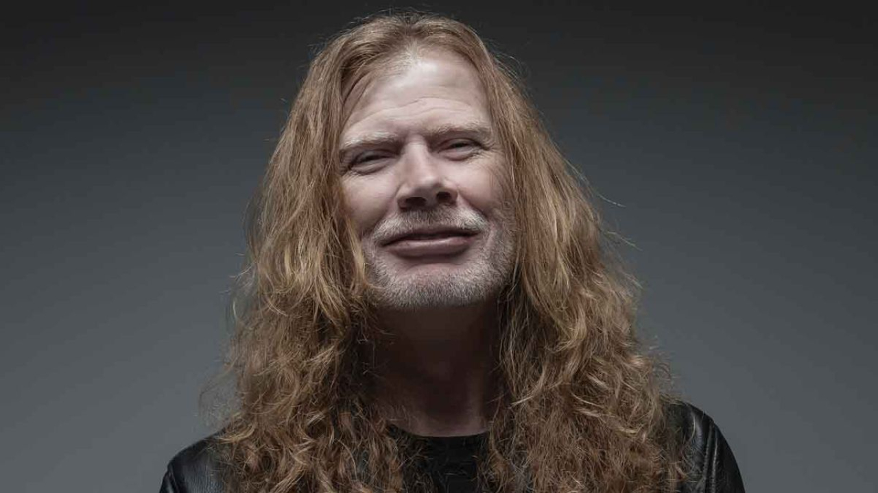 Dave Mustaine smirking at the camera