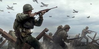 Soldiers storm the beach in Call of Duty WWII.