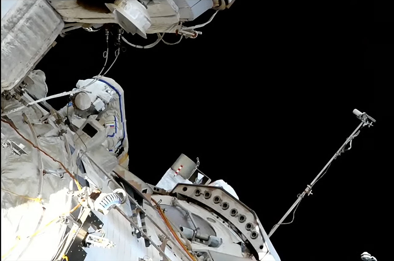 Russian cosmonaut Dmitry Petlin is seen at the rear end of the Zvezda Service Module outside the International Space Station during a spacewalk on June 22, 2023.