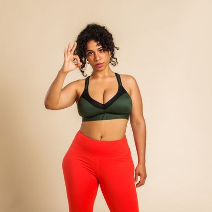 woman wearing sports bra and leggings