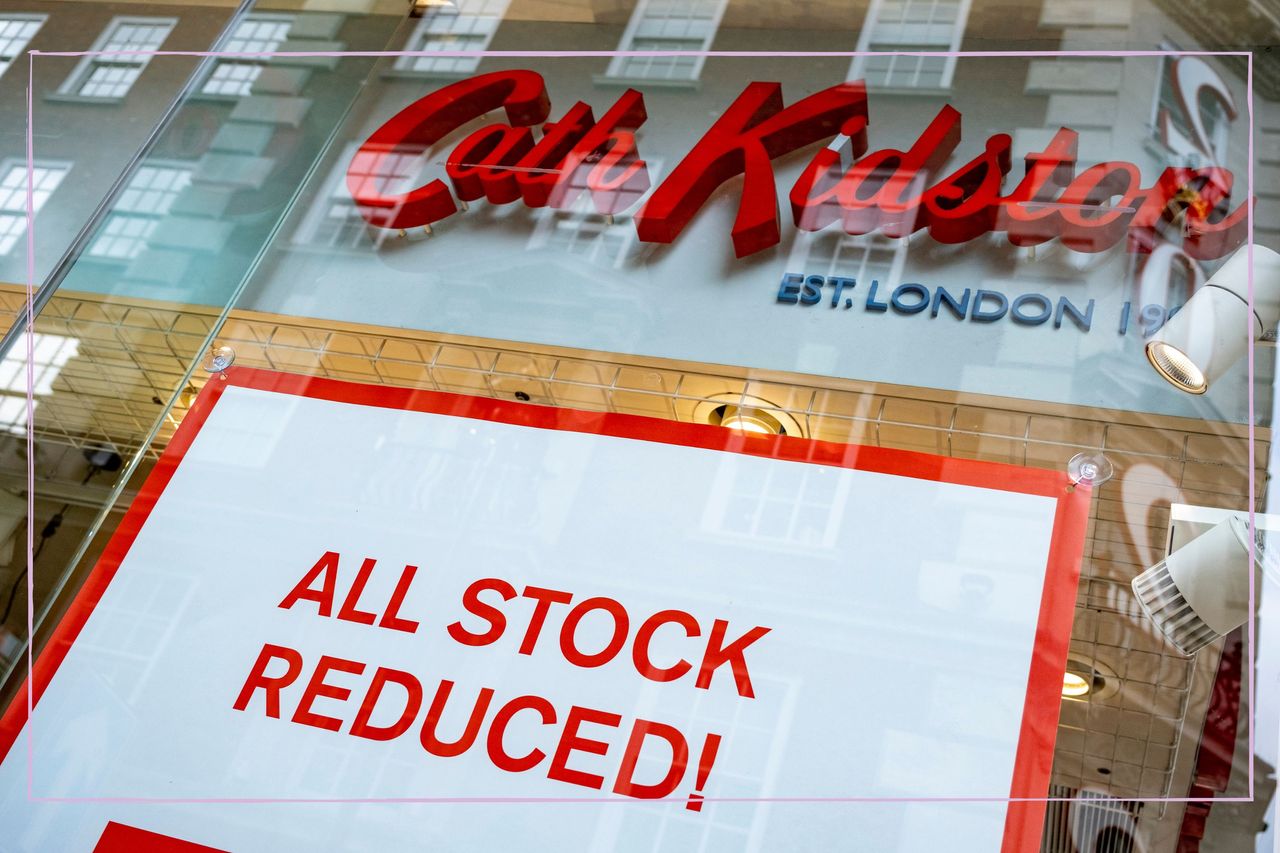 The front of a Cath Kidston shop with a sign saying &#039;All stock reduced&#039; in the window